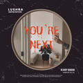Mirror with 'YOU'RE NEXT' decal, Lushra branding visible