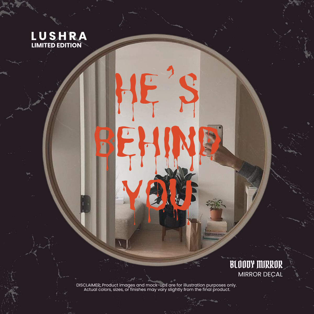 Mirror with 'He's Behind You' decal and Lushra branding on a dark marble background