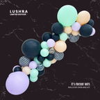 Balloon garland kit with colorful balloons on a black marble background, featuring the brand 'Lushra'.